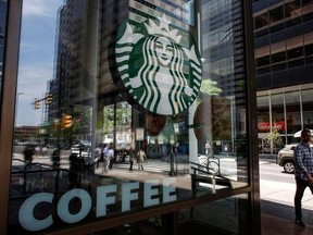 In this file photo taken May 29, 2018, the Starbucks logo it's seen outside a store in Philadelphia.