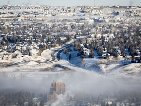 Canadian attitudes toward climate change are about as consistent as Canadian weather, a new poll suggests. An ice fog hangs over steaming neighbourhoods during a cold snap in Calgary on Saturday, Jan. 13, 2024.