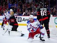 New York Rangers centre Jonny Brodzinski (22) celebrates his goal on Ottawa Senators goaltender Joonas Korpisalo (70) during second period NHL hockey action in Ottawa on Saturday, Jan. 27, 2024.