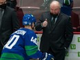 Former Canucks head coach Bruce Boudreau formed a bond with centre Elias Pettersson.