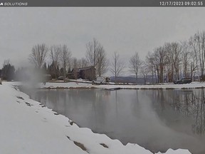 This body cam image provided by the Vermont State Police shows a pond just after a Vermont State Police trooper rescued a girl who had fallen through thin ice on the waterway, Dec. 17, 2023 in Cambridge, Vt.,