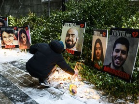 Members of the Iranian community gather and grieve on the fourth anniversary of the downing of Ukraine International Airlines Flight PS752, in Toronto on Sunday, January 7, 2024.