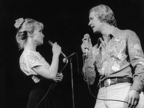Lynne Marta duets with David Soul in a file photo taken on March 17, 1977.