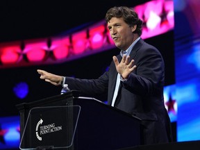 Tucker Carlson speaks at the Turning Point Action conference, Saturday, July 15, 2023, in West Palm Beach, Fla.
