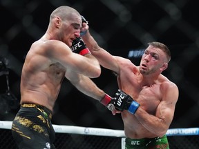 Two days after losing his middleweight title to Dricus Du Plessis in a split decision, Sean Strickland is disputing the result.&ampnbsp;Strickland, left, fights Du Plessis during a middleweight title bout at UFC 297 in Toronto, Sunday, Jan. 21, 2024.
