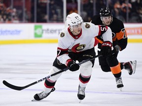 Ottawa Senators' Shane Pinto skates up ice during the second period of an NHL hockey game against the Philadelphia Flyers, Sunday, Jan. 21, 2024, in Philadelphia.
