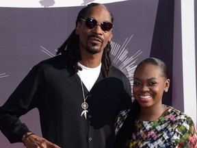Snoop Dogg with his daughter, Cori Broadus, at the 2014 MTV VMAs in California.