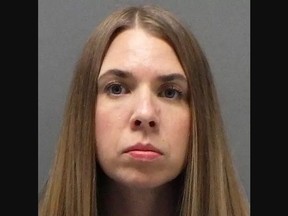 Mugshot of ex-teacher Tatum Hatch, who allegedly molested 15-year-old male student in vehicle while her baby was there.