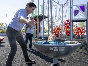 Prime Minister Justin Trudeau plays with his son Hadrien during a visit to Brampton, Ontario on Friday September 29, 2023.