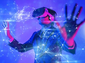 A man with virtual reality VR goggle playing AR augmented reality game and entertainment, futuristic lifestyle.