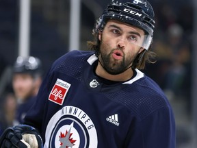 Alex Iafallo reacts during Winnipeg Jets practice on Monday, Jan. 15, 2024.