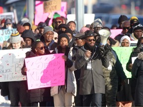 19 year old Afolabi Stephen Opaso was shot to death by police in Winnipeg, people marched in the streets on Saturday, Jan. 27, 2024, demanding the circumstances be investigated.
