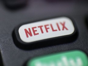 After announcing last The Netflix logo is pictured on a remote control in Portland, Ore., Aug. 13, 2020.