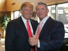 Vince McMahon (right) and Donald Trump attend a press conference in 2009.
