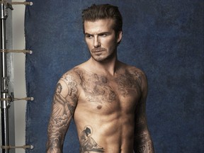 David Beckham poses for an H&M ad in 2014.