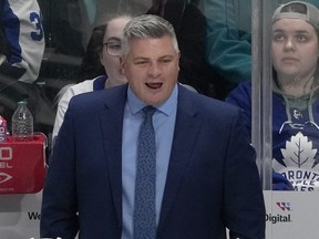 Toronto Maple Leafs head coach Sheldon Keefe reacts during a game.