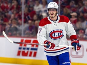 Canadiens' Kirby Dach calls out to a team-mate during the team's annual Red & White intrasquad game in Montreal on Sept. 24, 2023. The 23-year-old forward missed 24 games last season with injuries — including the last eight with a knee injury. In the second game this season, he tore both the MCL and ACL ligaments in his right knee and required season-ending surgery.