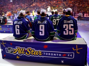 Brock Boeser (6), J.T. Miller (9) and Thatcher Demko (35) of the Vancouver Canucks take part in the draft during 2024 NHL All-Star Thursday at Scotiabank Arena on Thursday, Feb. 1, 2024, in Toronto.