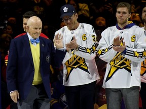 Hockey Hall of Famer Dave Keon is introduced as Will Arnett and Connor McDavid applaud during NHL All-Star Thursday at Scotiabank Arena on Thursday, Feb. 1, 2024, in Toronto.