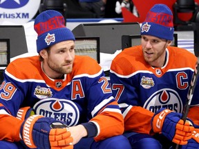 TORONTO, ONTARIO - FEBRUARY 02: Leon Draisaitl #29 and Connor Mcdavid #97 of the Edmonton Oilers talk during 2024 NHL All-Star Skills Competition at Scotiabank Arena on February 02, 2024 in Toronto, Ontario.