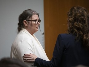 Jennifer Crumbley, the mother of Oxford, Michigan high school shooter Ethan Crumbley, listens to her attorney, Shannon Smith, in Oakland County Circuit Court immediately before the jury found her guilty on four counts of involuntary manslaughter on February 6, 2024 in Pontiac, Michigan.