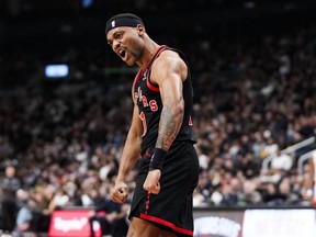 Bruce Brown #11 of the Toronto Raptors celebrates against the Houston Rockets during the first half at the Scotiabank Arena on February 9, 2024 in Toronto.