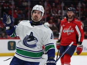Conor Garland of the Vancouver Canucks celebrates after scoring a goal against the Washington Capitals during the first period at Capital One Arena on Feb. 11, 2024 in Washington, DC.