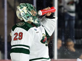 Marc-Andre Fleury #29 of the Minnesota Wild during a timeout against the Arizona Coyotes during the second period at Mullett Arena on February 14, 2024 in Tempe, Arizona.