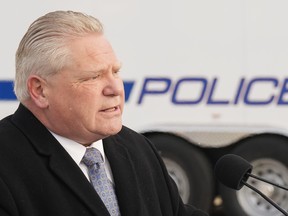 Ontario Premier Doug Ford speaks during a press conference at a Peel Regional police station in Mississauga, Ont., on Friday, Nov. 24, 2023.