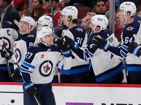 Nikolaj Ehlers (27) of the Winnipeg Jets celebrates after scoring his second goal of the game during the second period against the Chicago Blackhawks at the United Center on Feb. 23, 2024 in Chicago.