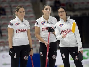 Briane Harris, left, with Shannon Birchard (centre) and Kerri Einarson, has been ruled ineligible for the Scotties Tournament of Hearts, which was set to begin Friday in Calgary.