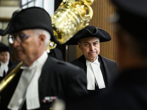 Then-Speaker Anthony Rota, right, walks into the House of Commons during the Speaker's Parade on Parliament Hill in Ottawa on Monday, Sept. 25, 2023.