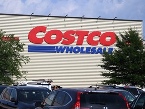 A Costco Wholesale warehouse sign is seen outside of a store in Silver Spring, Maryland, on August 5, 2023. (Photo by Mandel NGAN / AFP) (