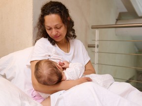 Mother breastfeeding her baby.