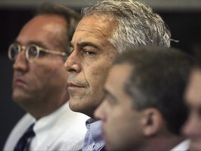Jeffrey Epstein appears in court, July 30, 2008, in West Palm Beach, Fla.