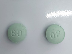 Public health officials in the Quebec City region say they have detected the dangerous opioid protonitazepyne in pale green tablets that appear to imitate prescription oxycodone as shown in this handout image.
