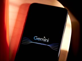 The Gemini logo on a smartphone.