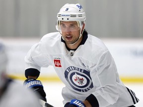 Brenden Dillon skates during Winnipeg Jets practice on Monday.
