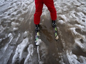 B.C.'s average snowpack is almost 40 per cent lower than normal, raising concerns about what Premier David Eby says are 'some of the most dramatic drought conditions that have been seen in our lifetime.' A skier slides through slushy snow at Whistler on Dec. 29, 2023.