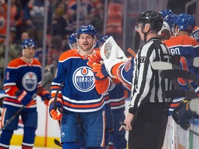 Zach Hyman (18)of the Edmonton Oilers, celebrates his second goal of the game and 40th goal of the season against the St. Louis Blues at Rogers Place in Edmonton on Feb. 28, 2024.