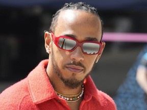 Mercedes driver Lewis Hamilton of Britain arrives at the Bahrain International Circuit in Sakhir, Bahrain, Thursday, March 2, 2023.