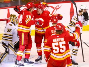 Calgary Flames Martin Pospisil scores on Boston Bruins goalie Linus Ullmark at the Scotiabank Saddledome in Calgary on Thursday, February 22, 2024.