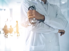 doctor with stethoscope in hospital health care.