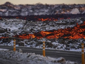 A view of lava near to the road to Grindav?k, close to the exit for the Blue Lagoon, in Grindav?k, Iceland, Thursday, Feb. 8, 2024.