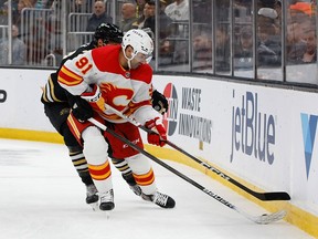 Calgary Flames forward Nazem Kadri battles for the puck during a game against the Boston Bruins on Feb. 6.