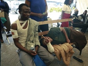 Residents who suffered burns following a fire caused by a vehicle loaded with gas which exploded, receive treatment at Mama Lucy Hospital in Nairobi, Kenya, Friday, Feb. 2, 2024. The truck explosion ignited a huge fireball, and a flying gas cylinder set off a fire that burned down the Oriental Godown, a warehouse that deals with garments and textiles, according to government spokesman Isaac Mwaura.