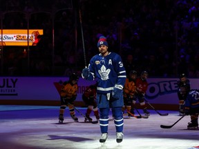 Auston Matthews of the Maple Leafs salutes the crowd while introduced prior to the 2024 NHL All-Star Skills Competition at Scotiabank Arena on February 2, 2024 in Toronto.