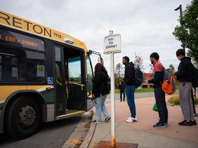 Some international students say Cape Breton University recruited thousands of pupils to a region that was not prepared for them, and they're now being blamed for those failures. Cape Breton University students board a bus after class in Sydney, N.S. on Wednesday, Oct. 18, 2023.