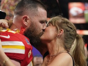 Taylor Swift kisses Kansas City Chiefs tight end Travis Kelce after the NFL Super Bowl 58 football game against the San Francisco 49ers, Sunday, Feb. 11, 2024, in Las Vegas.