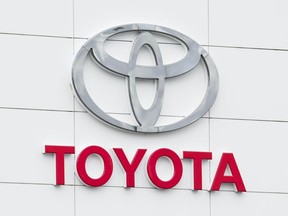 A Toyota vehicle logo is pictured at an automotive dealership in Ottawa on Friday, Aug. 11, 2023.